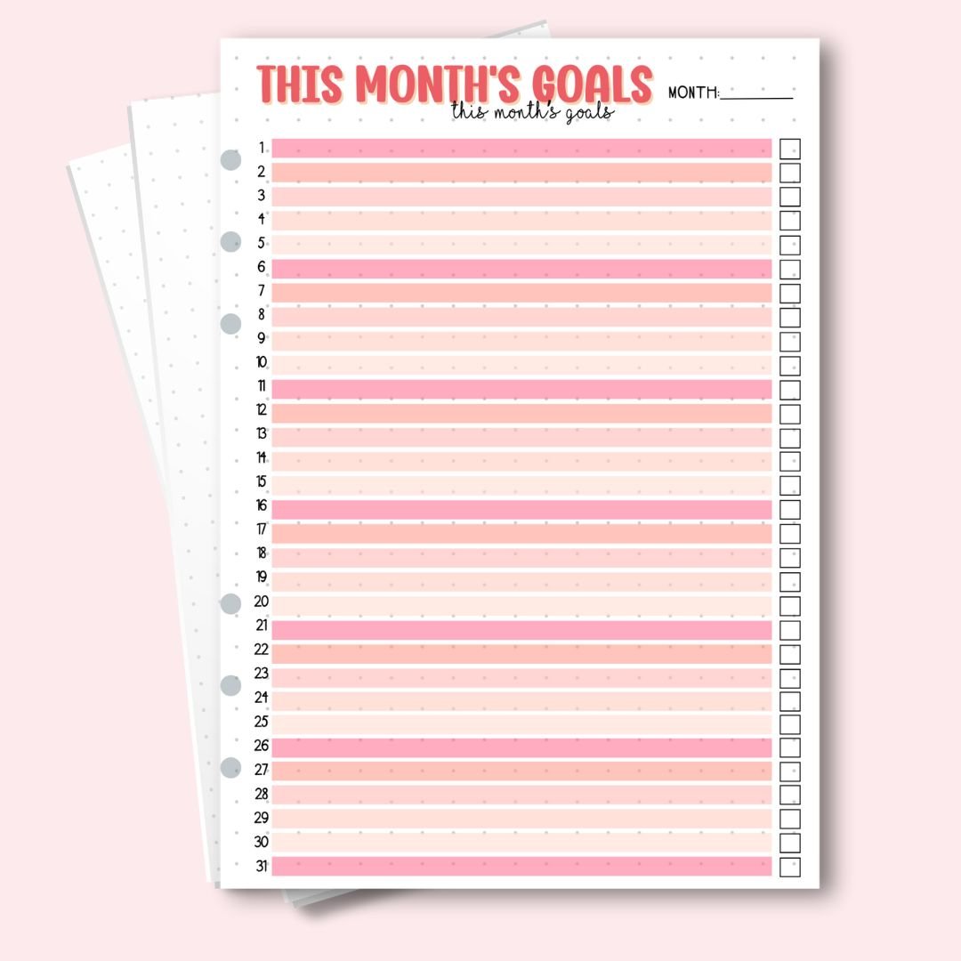 A5 monthly goals page with coral pink stripes and checkboxes