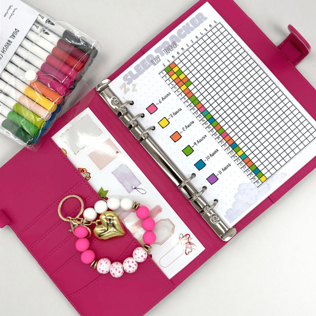 Bullet journal with sleep tracker insert and beaded bracelet keychain