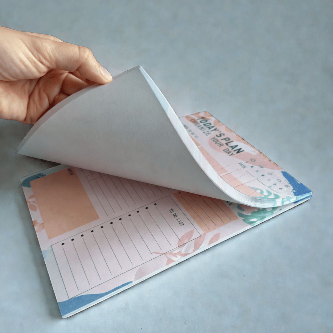 Daily planning pad with sections for goals, appointments, and activity tracking