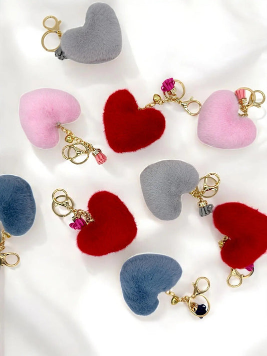 Fluffy heart pom-pom keyrings for journals
