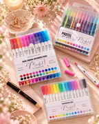 Highlighter pens and journaling accessories on a blush desk