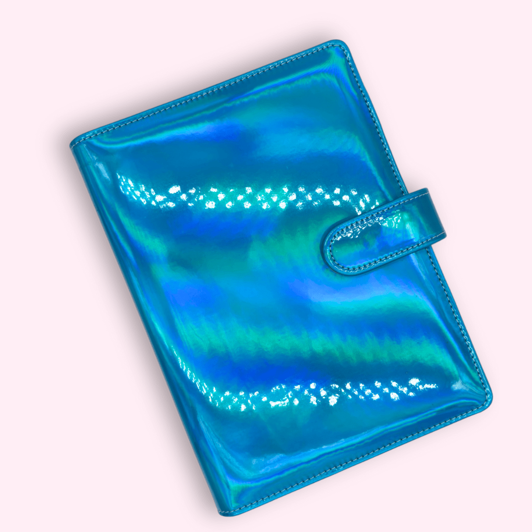 Holographic journal case with pen loops and magnetic flap for secure planning