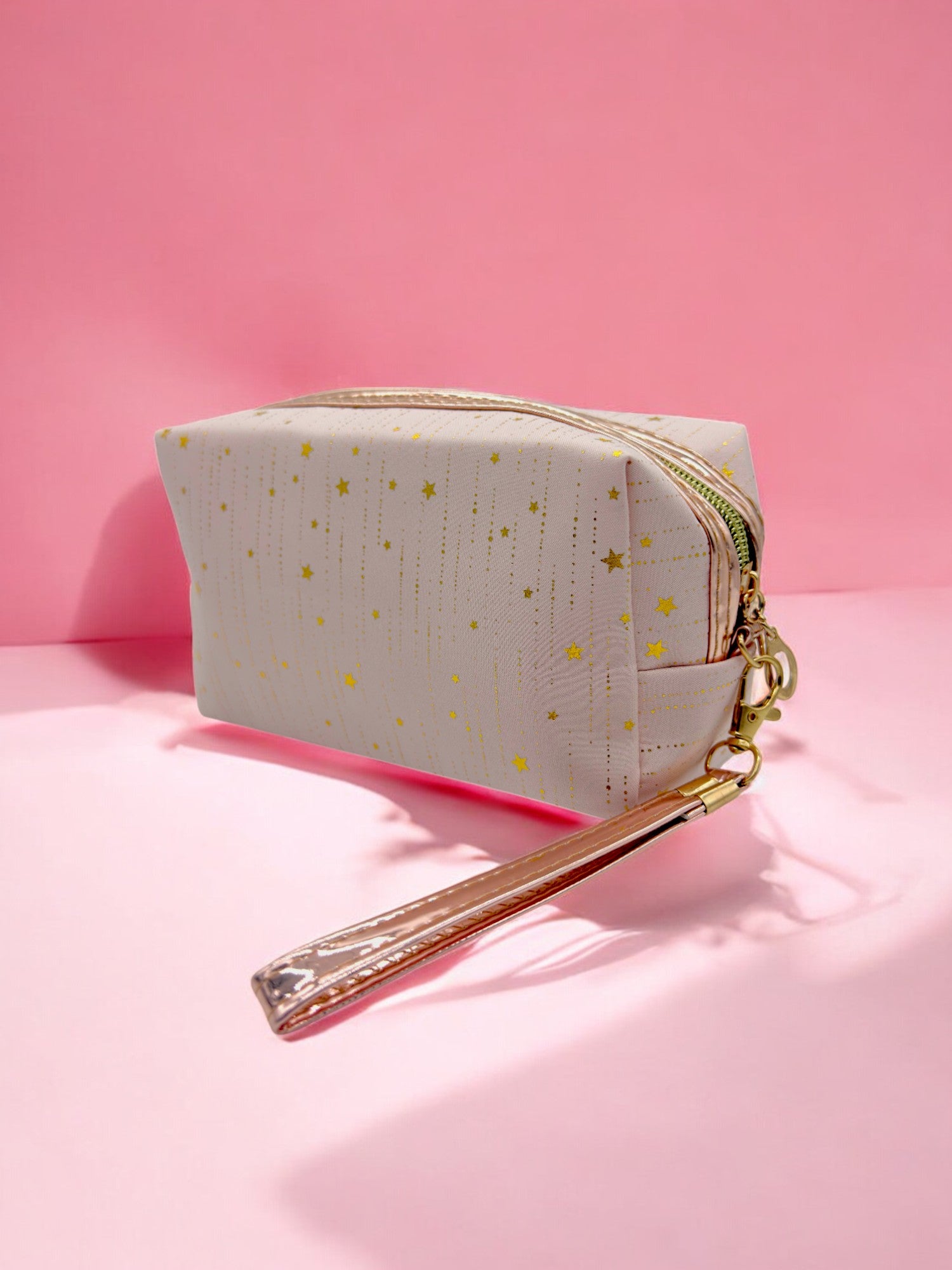 Light pink Rose gold strap pouch with glittery finish, ideal for travel or school supplies