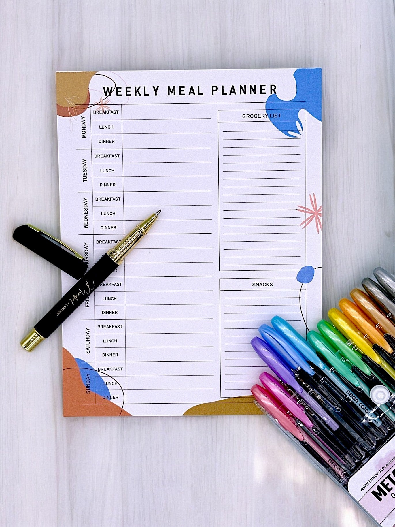 Magnetic fridge meal planner with tear-away pages, grocery list and snack section