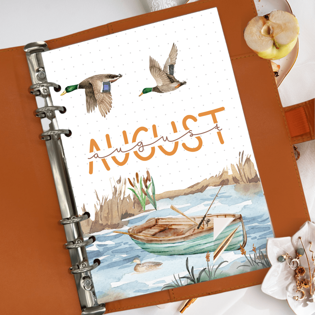 Peaceful bullet journal monthly cover featuring lake scene