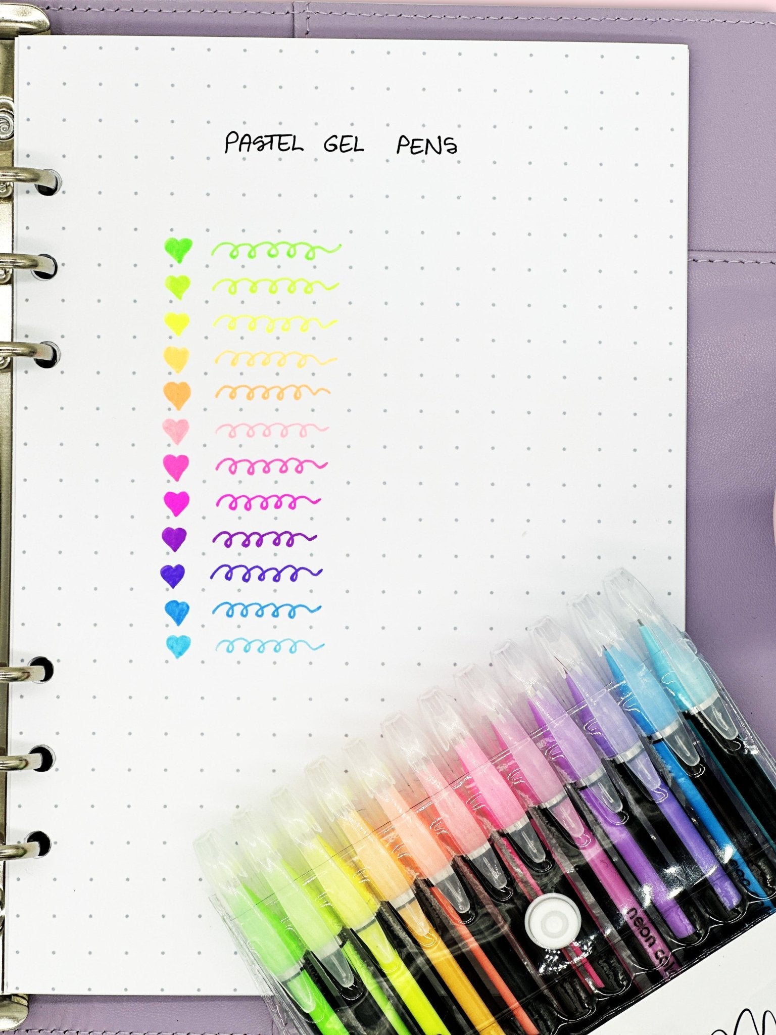 Smooth pastel gel pens in a snap-close pouch for creative stationery