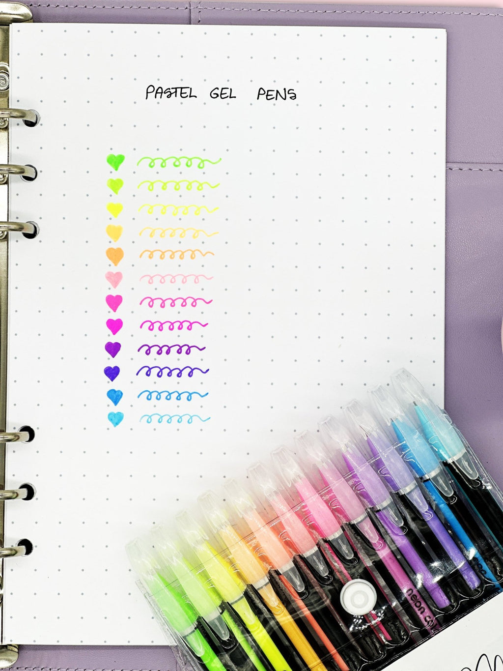 Smooth pastel gel pens in a snap-close pouch for creative stationery