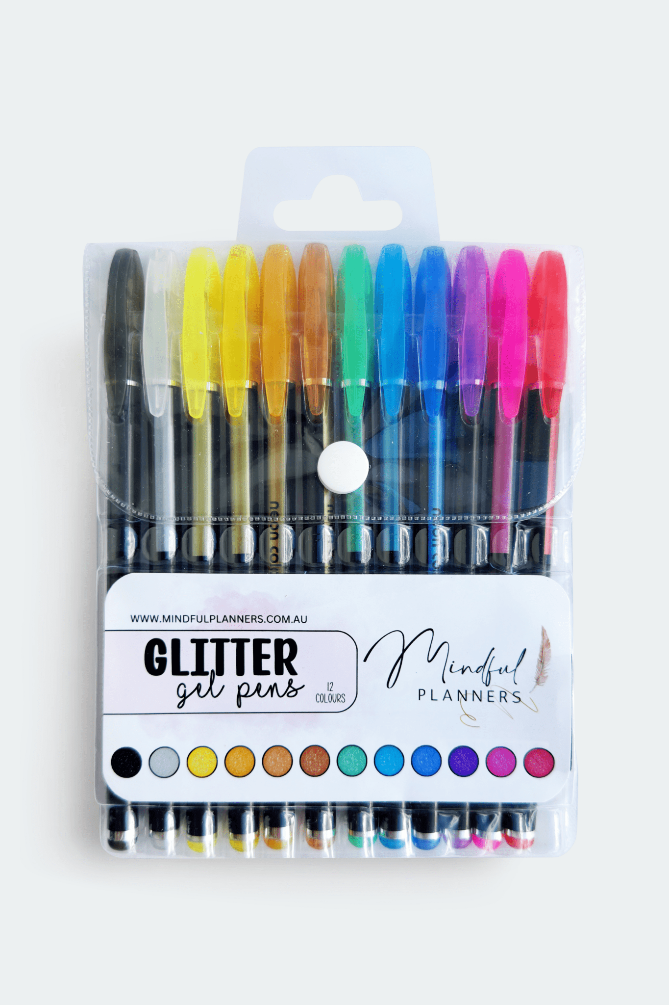 Colourful glitter gel pens adding sparkle to bullet journals, planners, and crafts