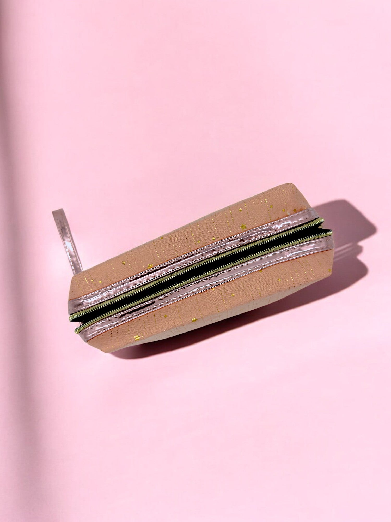 Top view of Peach colour Waterproof pencil case that fits over 100 pens with durable zipper and stylish sparkle