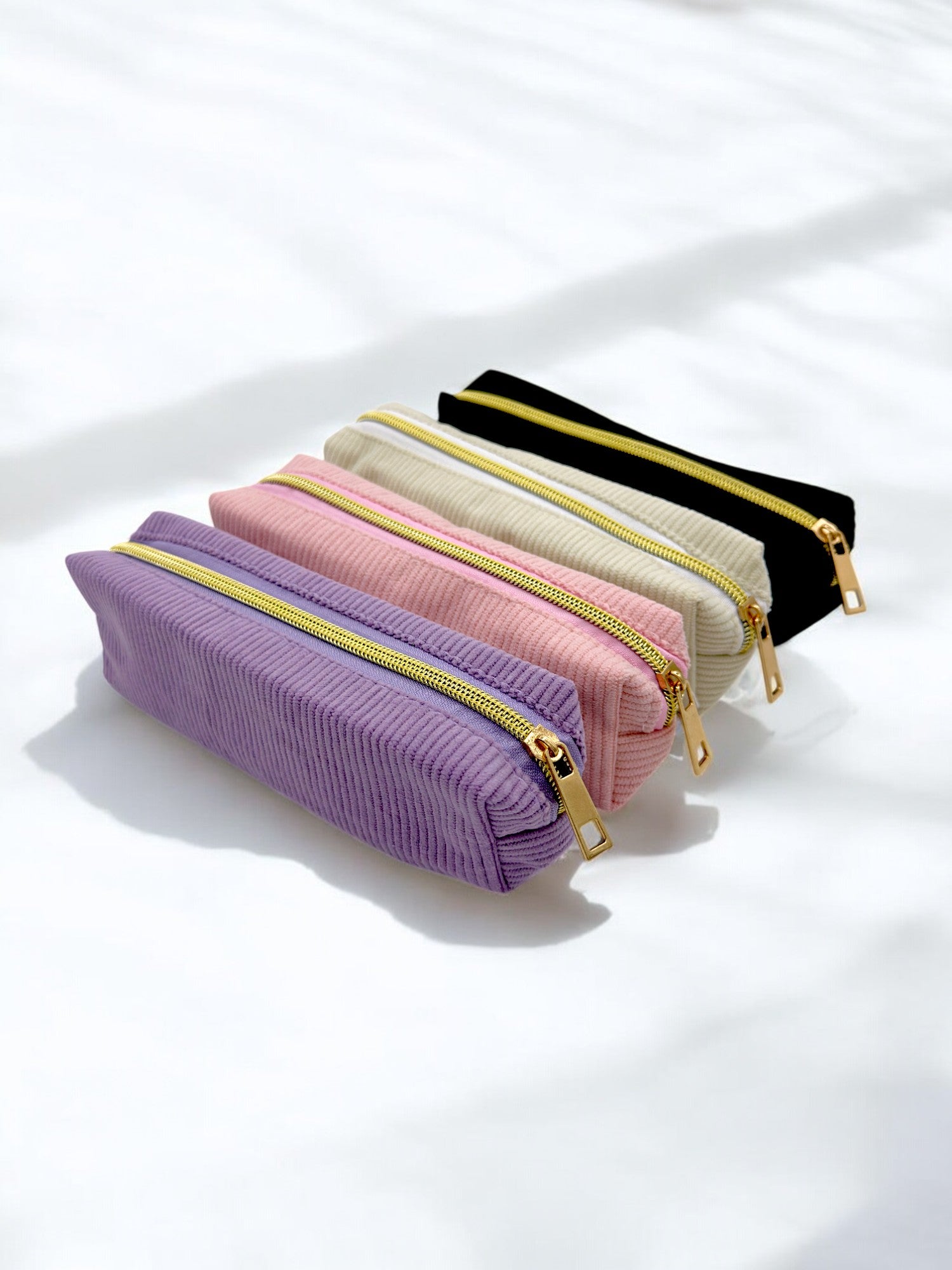 Velvet pencil case with waterproof interior and golden zipper in small size​