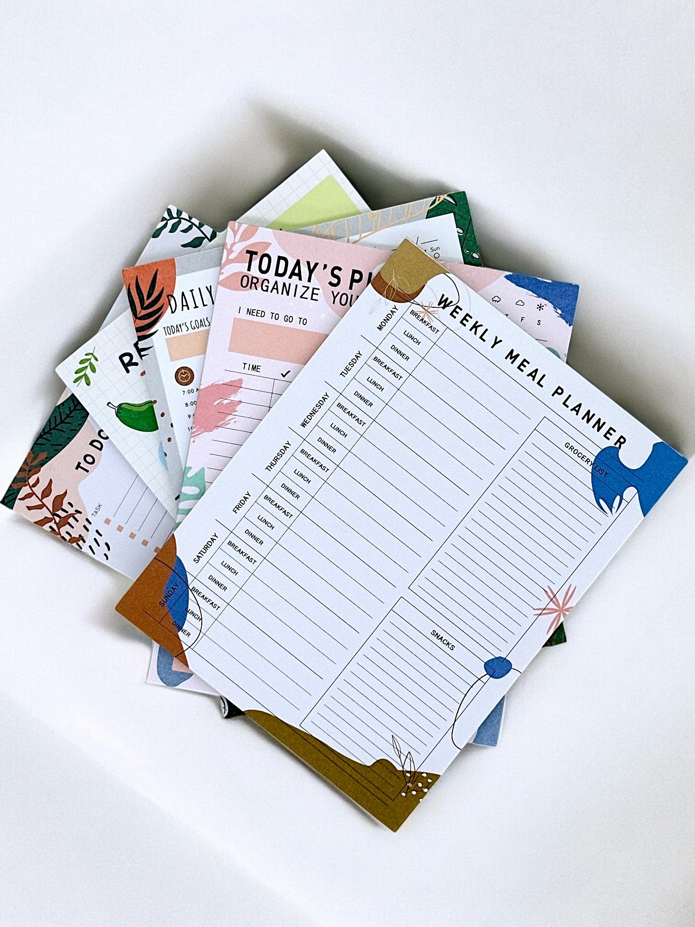 Weekly food planner pad with space for meals and shopping list, perfect for meal prep