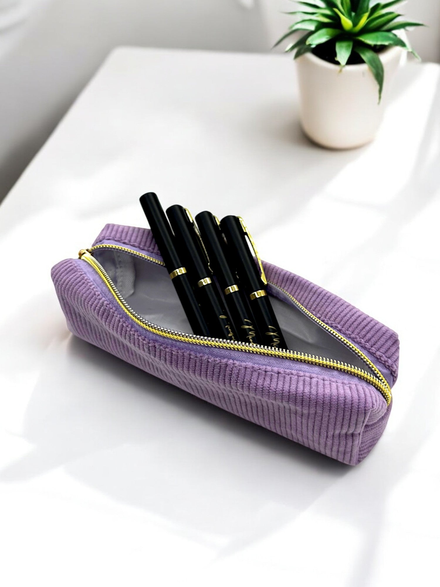 elegant black and gold journaling pen in our pencil case
