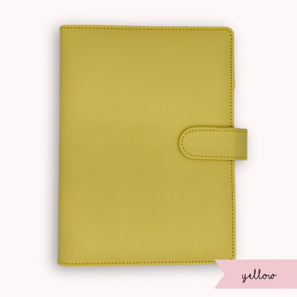 Yellow planner cover on a white background