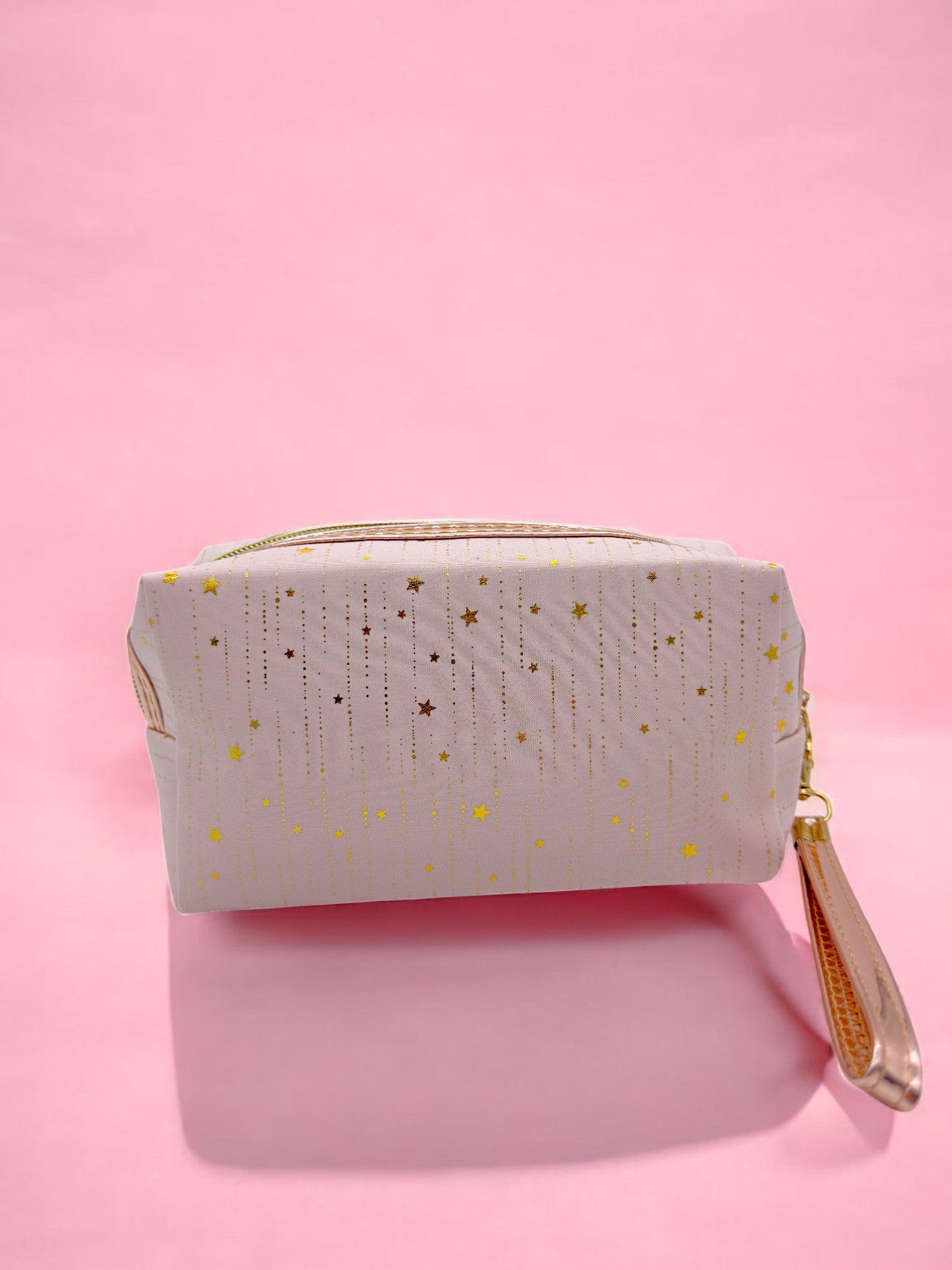 light pink Rose gold strap pouch with glittery finish, ideal for travel or school supplies